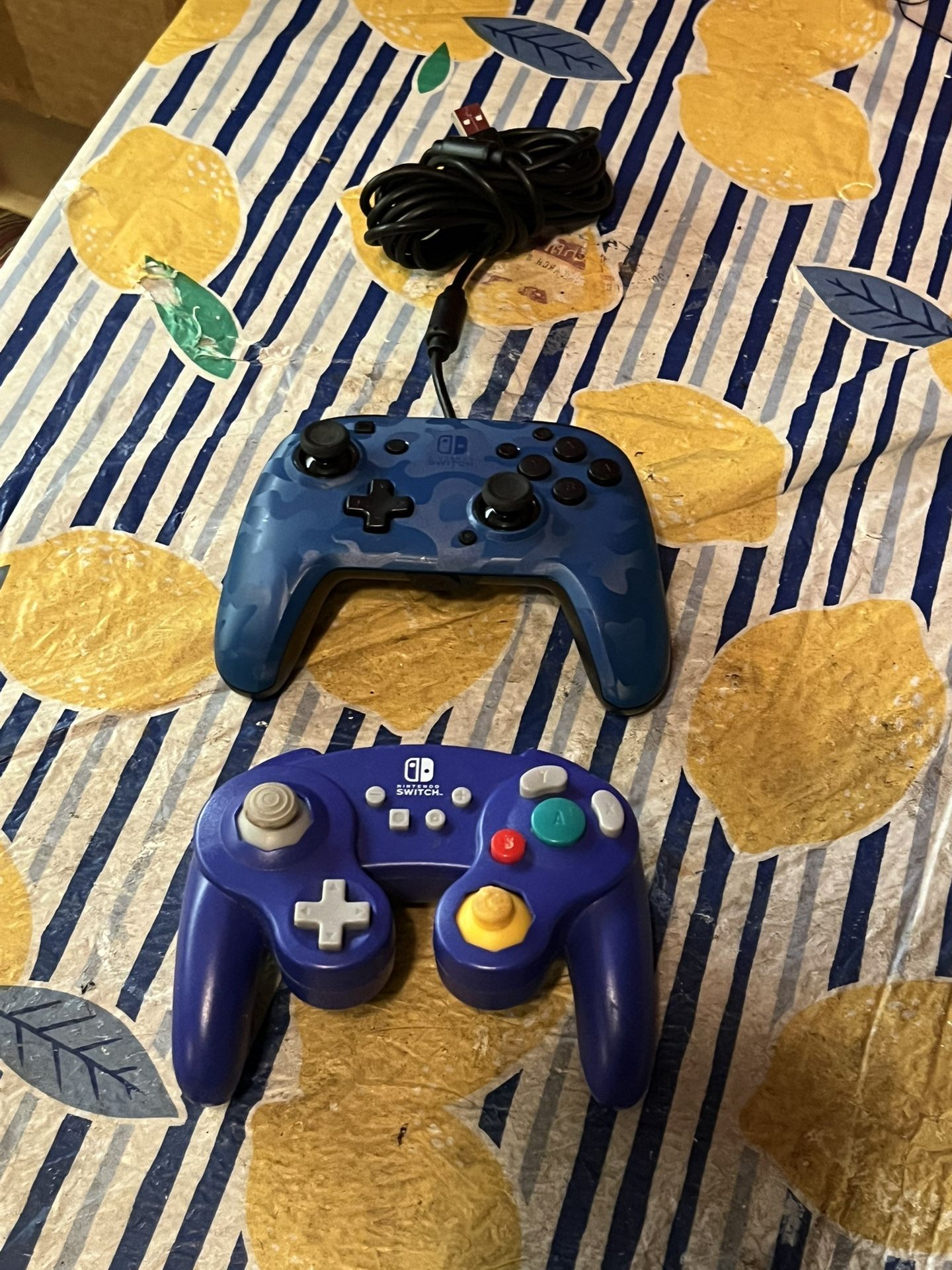 Two Nintendo Switch Remotes, One Wireless One Wired