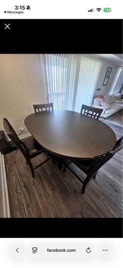 Dark Wood Oval Dining Table with 4 Chairs