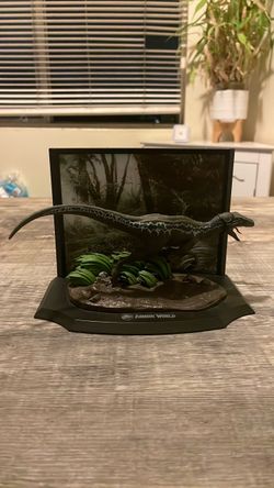 Jurassic world noble collection blue dinosaur statue
