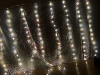 Tapestry and string lights