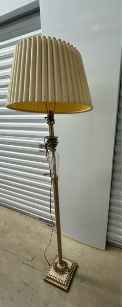 vintage brass candlestick-style floor lamp