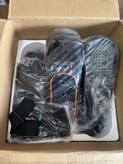 Elliptical Black with Orange Trim  U5 -HN under the desk