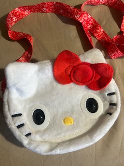 Hello kitty interactive talking purse