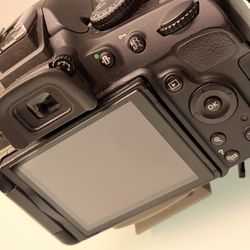 Nikon D5100 DSLR Camera with 18-55mm f/3.5-5.6 Auto Focus-S Nikkor Zoom Lens