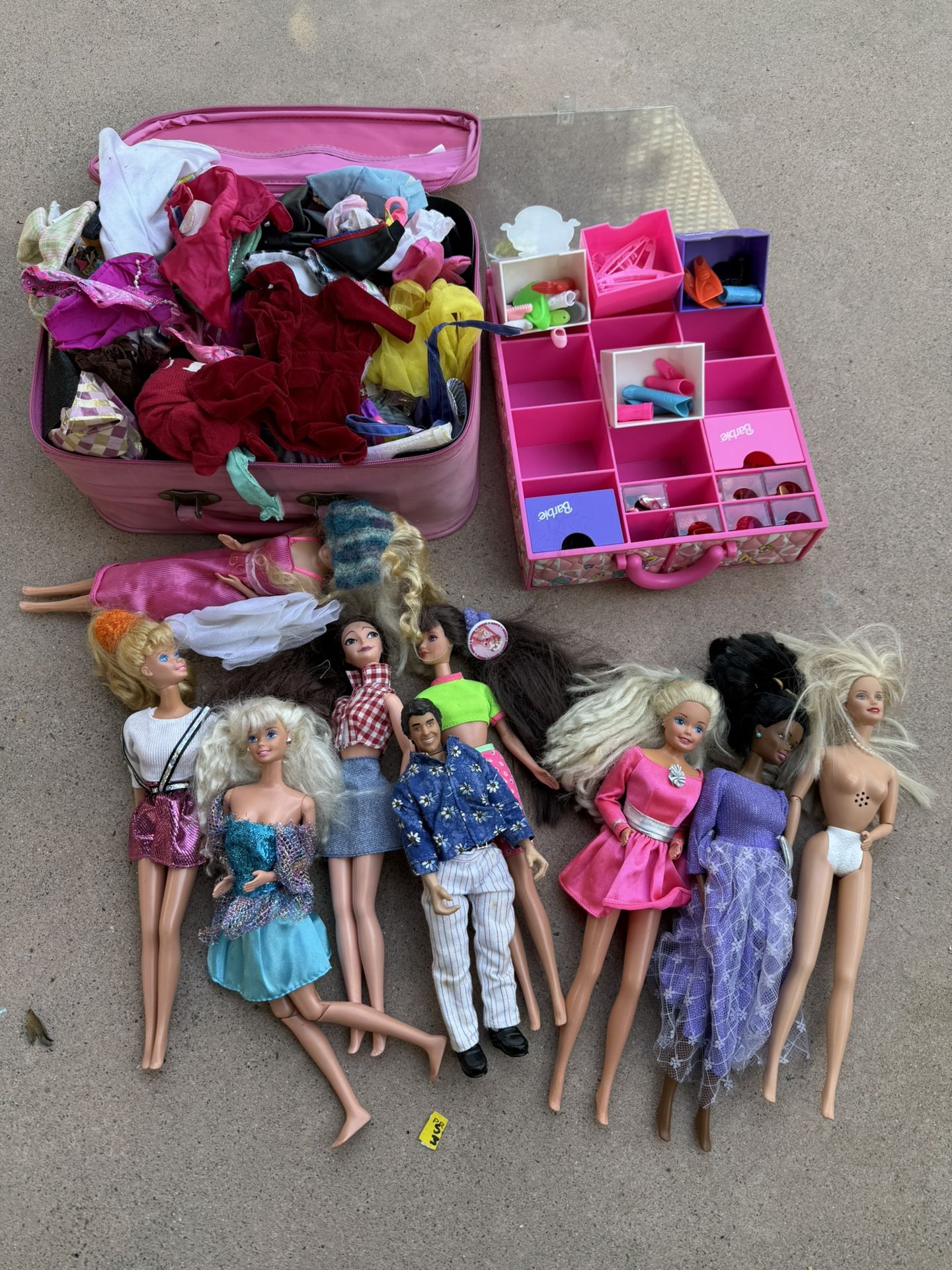 Vintage Barbies with tons of clothes and accessories, check pictures for price on luggage alone
