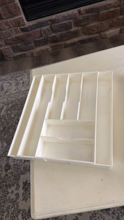 Drawer organizers.  One is expandable.  Both for $10