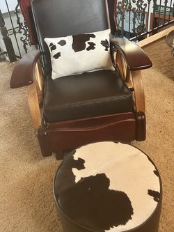 Pristine Wagon Wheel Rocker Chair With Cowhide Ottoman