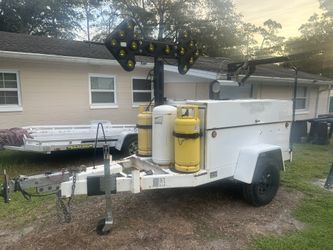 12.5 kw Generator, air compressor, (2) air hose reels, air line dryers, blower, arrow board, crane/winch