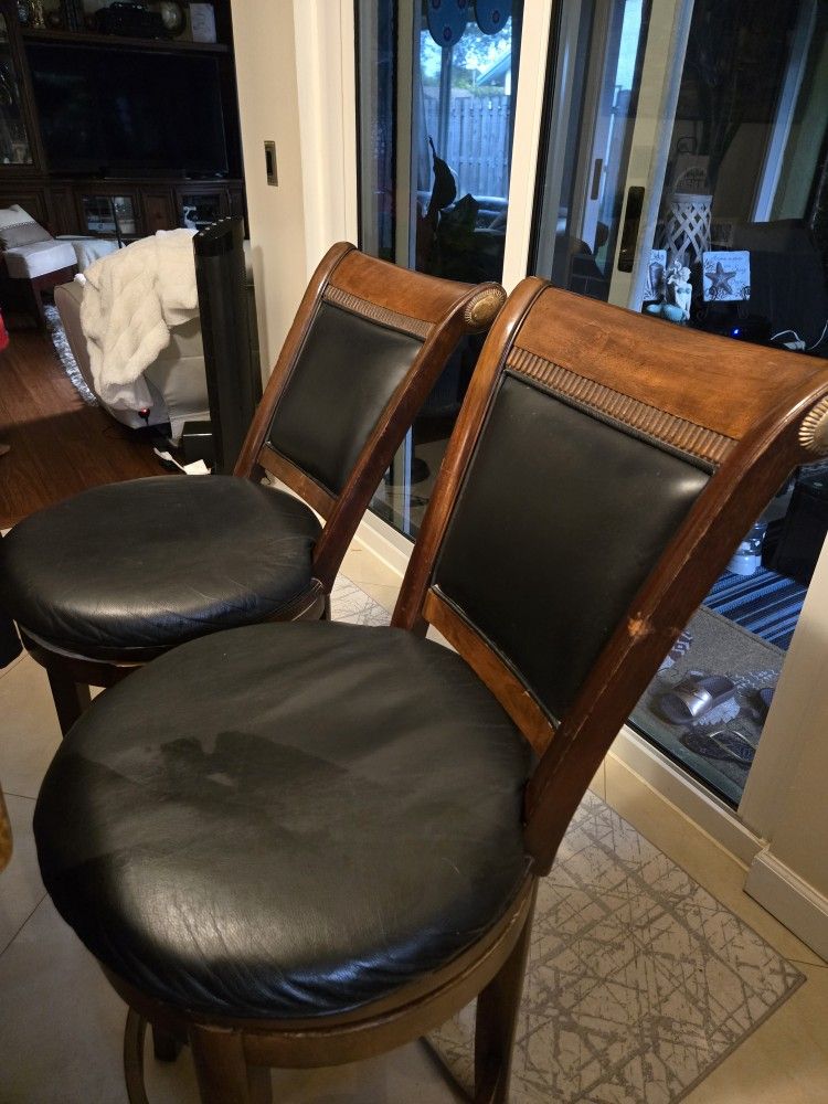 2 leather counter stools