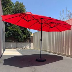 $130 (New in box) Large 15ft double sided outdoor umbrella w/ 65 lbs plastic weight base (red/gray)
