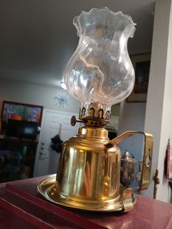 Antique brass wall oil lamp made in England