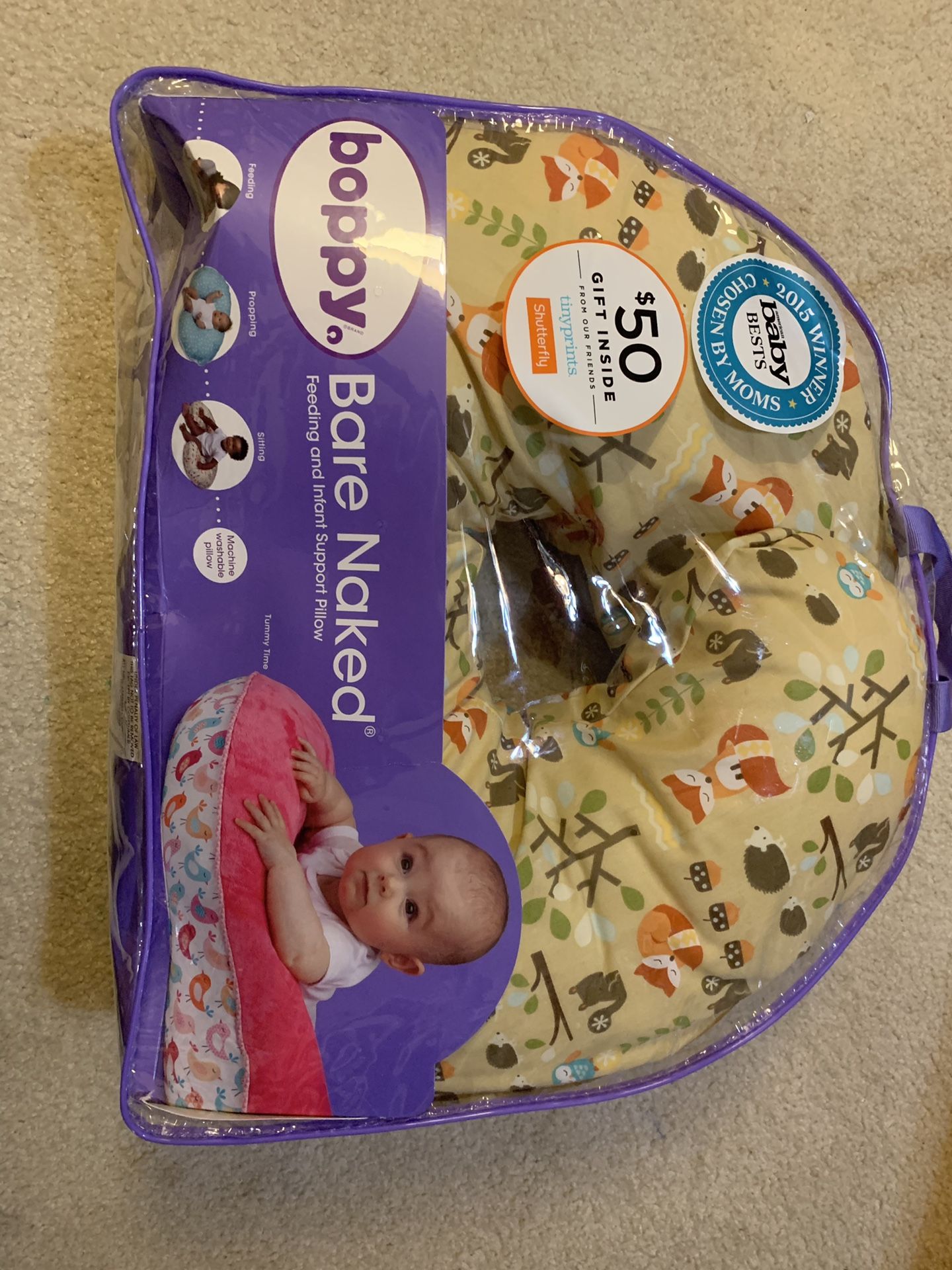 Boppy nursing pillow and positioner