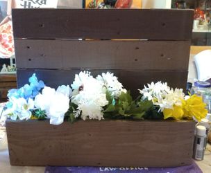 Outdoor wall decor only, flowers not included