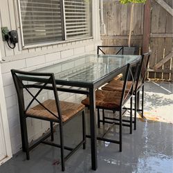 Metal and glass dining table and 4 chairs