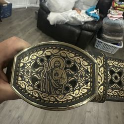 San Judas gold colored leather belt, laser cut design