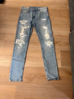 Levi's Light Wash Distressed Slim Jeans