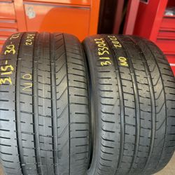 22” tires pirelli 315/30/22 semi new with free installation $200