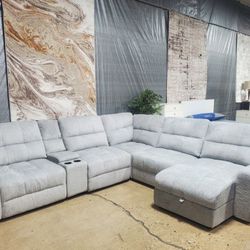Beautiful Comfortable  Gray Sectional With  2 Power Sliding Chaise (New)