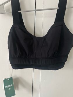 New Halara black sports bra with tags.