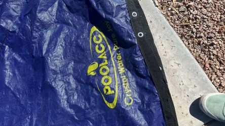 Large rounded pool cover 27 feet across
