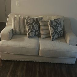 Beige Ashley Furniture Couch 