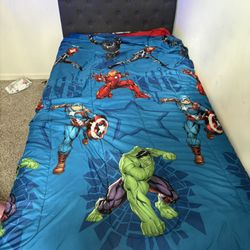 Twin Bed With Mattress. Comes With Averages Comforter And Sheets And Spider-Man Comforter 