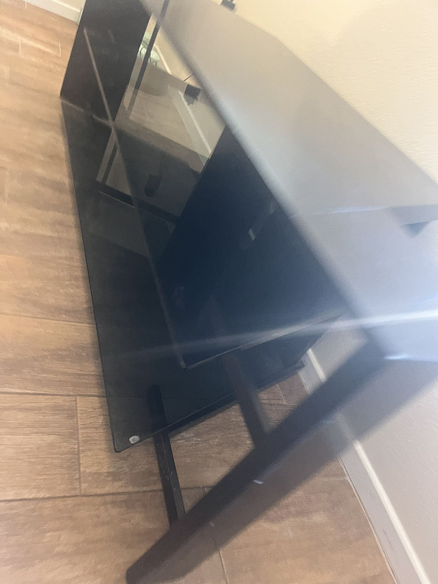 Black TV stand with glass holders