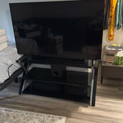 Tv And Sound Bar And Tv Stand