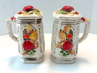Vintage (1960’s) ceramic salt and pepper shakers featuring a Della Robia fruit motif