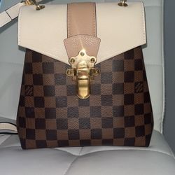 Louis Vuitton purse/backpack