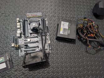 Intel Core i7-4930K, Gigabyte GA-X79-UP4 Motherboard, Corsair CX600 PSU, and Liquid Cooler Bundle