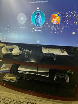 PS5 with 2 controllers and headphones