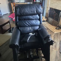 Full Leather recliner (needs new motor) $100 obo
