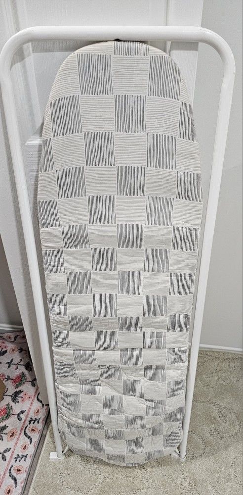 Barely used full size hang over door ironing board.
