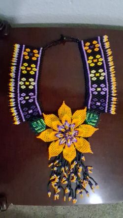 Beautiful indigenous hand made beaded flower necklace and earrings