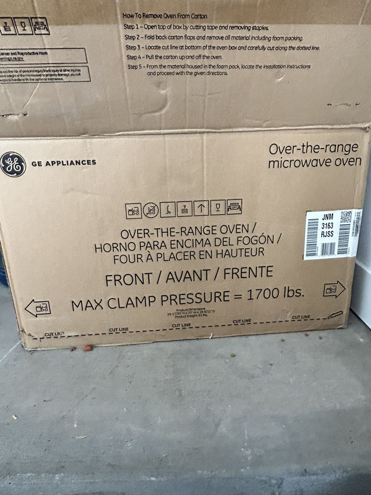 Brand New GE Over The Range Microwave Oven