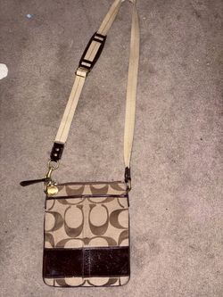 Coach brown and beige crossbody bag with repeating c logo