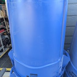 Blue 55 Gallon BRUTE trash Cans.