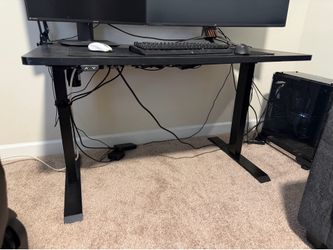 Adjustable automatic sit/stand black desk