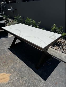 Dining table with quartz top