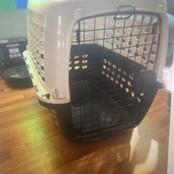 Two medium dog crates