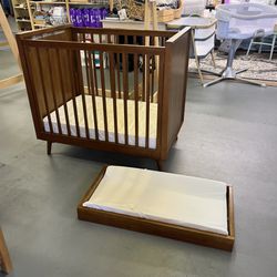 West Elm Mini Crib With Pottery Barn Mattress with dresser top changing table pad!