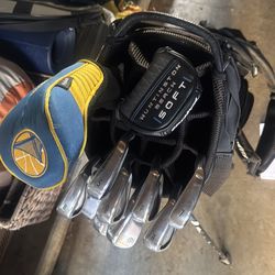 Set of Titleist, Taylormade, Nike, and Cleveland Golf Clubs