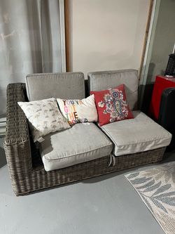 Wicker Outdoor Loveseat with Gray Cushions