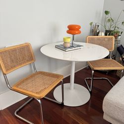 Round white table with chairs