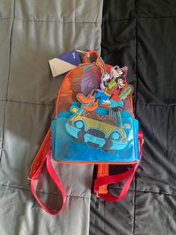 Disney Goofy and Mickey Mouse in a car backpack