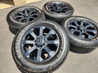 20" Dodge Ram 2500 black wheels and tires