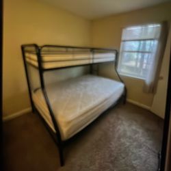 Bunk Bed with mattress  included.  Moving and can’t take with. 50 bucks and it’s yours.