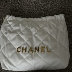 white and gold bag