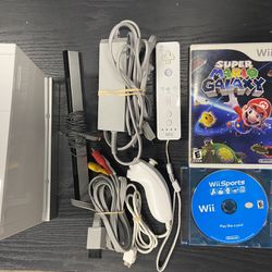 White Nintendo Wii Console With 2 Games For Sale $110 OBO. Tested. Works